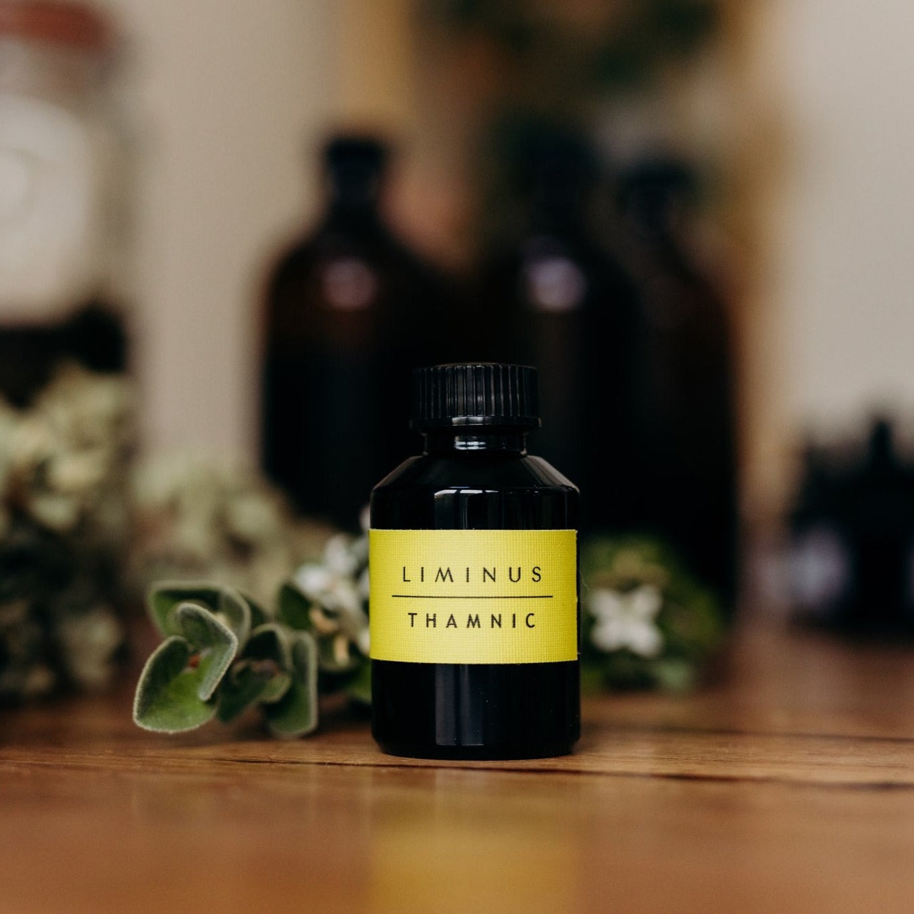 10ml perfume refill on wooden table